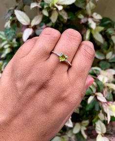 Green Peridot Ring 925 Sterling Silver Ring Heart Cut August Birthstone Ring Slim Ring Right Hand Ring Birthday Anniversary Christmas Gift This is an amazing natural green peridot ring made from 925 solid sterling silver and peridot gemstone. This ring is a layering ring. It is a great ring as a gift to your loved ones. This has a heart cut gemstone. This is a unisex ring. This handmade ring has a 6mm stone.  If You Would Like To Inquire Further, Please Do Not Hesitate To Contact Us Description: Weight: 2.00 Grams Stone Shape: Heart Cut Stone Size: 6mm Stone Type: Peridot Color: Green Stone Creation: 100% Natural Metal: 925 Sterling Silver  If You Would Like To Inquire Further, Please Do Not Hesitate To Contact Us Payment Policy: We accept payment through PayPal. All payments must be made Baguette Cut Ring, Birthstone Promise Rings, August Birthstone Ring, Slim Ring, Twisted Band Ring, November Birthstone Ring, Summer Rings, Right Hand Ring, Single Stone Ring