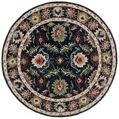 a round rug with floral designs on it