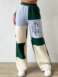 Casual Gray Patchwork Pants, Casual Gray Pants With Patchwork, Green Sporty Sweatpants With Letter Print, Sporty Green Sweatpants With Letter Print, Green Stretch Bottoms With Letter Print, Casual Color Block Jogging Bottoms, Casual Jogging Color Block Bottoms, Trendy Green Sweatpants For Sports, Multicolor Casual Gym Pants