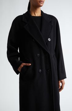 Expertly hand-stitched in the softest virgin-wool-and-cashmere blend, this long coat is a classic with a straight silhouette cinched by a waist-defining belt. Double-breasted button closure Notched lapels Front welt pockets Cupro-blend lining 90% wool, 10% cashmere Dry clean Made in Italy Designer Clothing Classic Black Cashmere Wool Coat, Red Lacquer, Cashmere Coat, Max Mara, Long Coat, Welt Pockets, Hand Stitched, Women's Pumps, Hand Stitching