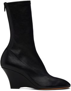 Mid-calf grained nappa lambskin boots in black. · Zip closure at back · Sock-style collar · Bonded jersey lining · Covered wedge heel with rubber injection · Nubuck sole · Heel: H3 Supplier color: Black Black Flat Boots, Sock Style, Logo Shoes, Wedge Ankle Boots, Flat Boots, Fashion Socks, Leather Wedges, Mid Calf Boots, Black Ankle Boots