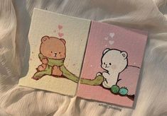 two small cards with teddy bears on them sitting next to each other in the bed