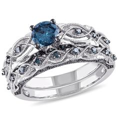 a blue diamond and white gold wedding ring set