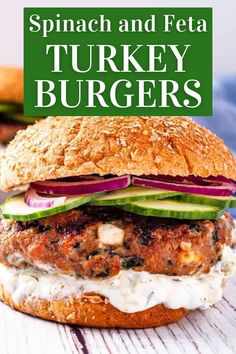 spinach and feta turkey burgers on a wooden table