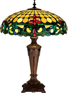 a table lamp with a colorful glass shade on it's base and an ornate design