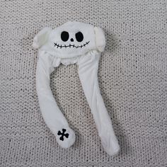 Stay Warm And Stylish This Winter With This Adorable Plush Hat! Featuring Moving Ears. This Hat Is Perfect For Fans Of The Nightmare Before Christmas. It's Zero, Jack's Ghost Dog. The White Color And One Size Fits All Design Make It Easy To Pair With Any Outfit. Kids And Teens Are Going To Love This Fun Design, Making The Ears Flap With Just A Squeeze. Add A Touch Of Fun To Your Winter Wardrobe With This Hilarious Plush Hat! Plush Hat, Cute Cap, Ancient Recipes, Cute Caps, Ghost Dog, The Nightmare Before Christmas, The Nightmare, Fun Design, Nightmare Before