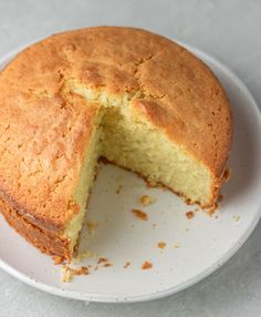 an easy vanilla sponge cake on a white plate