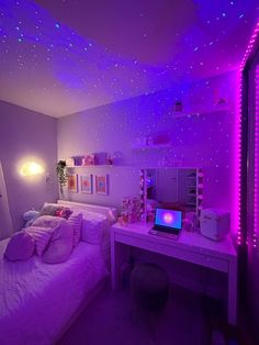 a bedroom with purple lighting and stars on the ceiling