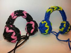 there are two different types of bracelets on the white table and one is black, yellow, pink, and blue