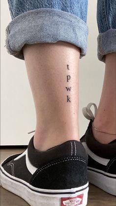 a woman's lower leg with the words i love you written on her left side