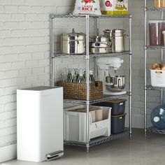 a kitchen shelving unit with various items on it