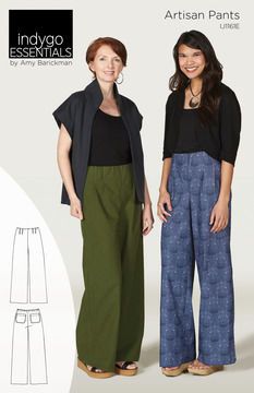 two women wearing wide legged pants and black top