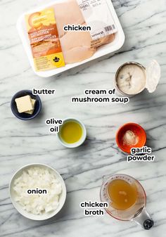 ingredients to make chicken broth laid out on a marble counter top with text overlay