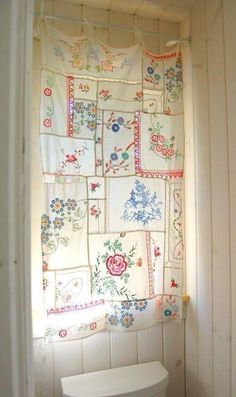 an open door with a floral curtain in it