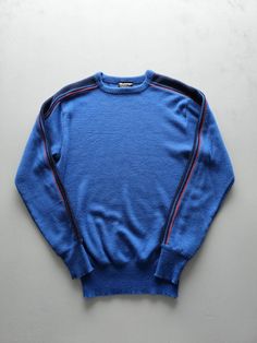 Listing: Vintage 1970s Meister Blue Acrylic Tight Knit Crewneck Sweater M Size on Tag: M Flaws: Fabric pilling Measurements: Please see the photos in the listing. If you require additional measurements or information about this item, feel free to send a message. Blue Fitted Wool Sweater, Fitted Blue Wool Sweater, Blue Fitted Knit Sweater, Fitted Blue Knit Sweater, Retro Blue Winter Top, Retro Blue Crew Neck Sweater, Blue Retro Crew Neck Sweater, Fitted Blue Sweater With Ribbed Cuffs, Retro Blue Knit Top