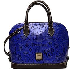 The blue leather bag features Mickey, Minnie, Sleeping Beauty Castle and other Disneyland 60th icons in an embossed pattern, with dark leather trim, golden hardware,...
The post Disneyland 60th Diamond Celebration Dooney & Bourke Satchel Handbag Blue appeared first on DINUS. Blue Leather Bag, Disney Bag, Satchel Handbag, 60th Anniversary, Disney Accessories, Disney Merchandise, Dooney & Bourke Bags