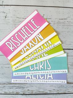 four different colored stickers on top of each other with the words disquelle, jehann, and christ