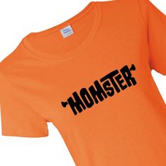 There's nothing scarier than a Momster on Halloween! These magnificent creatures are terrifyingly capable, horribly efficient and packed full of love and warmth. Wear your Momster label proudly in this Halloween T-shirt! An essential addition to your Halloween supplies, it makes a great gift and it's perfect to wear while walking your costumed little ones around the neighborhood for trick-or-treating. Wear it instead of a Halloween costume! © OTC

o Fits sizes 4-6
o Brand: Gildan
o Sho Halloween Supplies, Full Of Love, The Neighborhood, Halloween T Shirt, Halloween Party Decor, Halloween Women, Halloween Tshirts, Halloween Gifts, Cool T Shirts