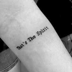 a person with a tattoo on their arm that says, what's the spirit?