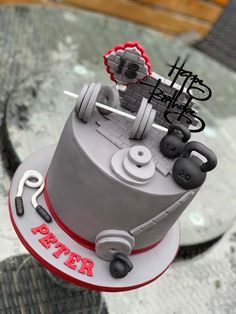 a cake that is sitting on top of a table with some type of equipment on it