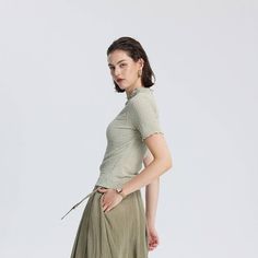 Women's Slim Fit Short Sleeve Mock Neck T-Shirt - A New Day™ Sage Fitted Khaki Short Sleeve Top, Green Textured Knit Cotton Tops, Green Textured Knit Short Sleeve Tops, Green Textured Knit Turtleneck Top, Khaki Short Sleeve T-shirt For Spring, Green Fitted T-shirt For Spring, Textured Knit Short Sleeve T-shirt For Summer, Summer Textured Knit T-shirt With Short Sleeves, Green Short Sleeve Cotton Knit Top