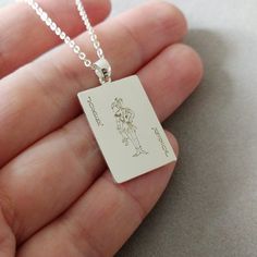 "Personalized Any Playing Card Necklace, Custom Poker Necklace, Blackjack Lover Gift, Poker Lover Gift, Themed Decks of Cards Accessory The custom poker necklace is made out of 925 sterling silver, the length of the sterling silver chain can be selected in 14\",16\",18\",20\", or 22\". You can have it done in sterling silver,18k gold plating, white gold plating, and rose gold plating. All of my products are handmade. Why buy from us? Quality Product At Affordable Prices 1.2mm Super Thickness. 10 Joker Playing Card, Card Necklace, Playing Card, Blackjack, Deck Of Cards, Gold Plating, Gift For Him, Sterling Silver Chains, Gift For Lover