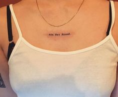 a woman wearing a white tank top with the words, not found on her chest