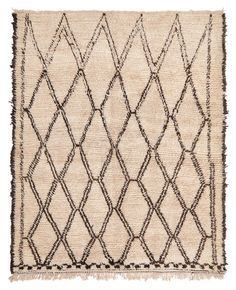 an old rug with fringes on the bottom and black lines in the middle, against a white background