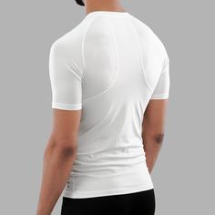 If you're an athlete or someone who enjoys working out a lot then you'll want to invest in a sleeveless compression shirt. There are many benefits it offers such as protecting your skin and body from the sun and it will also keep you cool as you break a sweat outdoors. We have the mens sleeveless compression shirt in stock and ready to order for both men and women. They're available in two colors in a black sleeveless compression shirt or in a white sleeveless compression shirt. You'll be kept c White Stretch Crew Neck Rash Guard, White Stretch Rash Guard With Crew Neck, Functional Moisture-wicking Rash Guard For Workout, White Technical Compression Activewear, White Compression Technical Activewear, White High Stretch Short Sleeve Activewear, White Fitted Top For Training, White Moisture-wicking Rash Guard For Sports, White Crew Neck Sporty Rash Guard