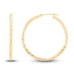 Dynamic round tubes are embellished with distinctive diamond-cut patterns in these stylish women's hoop earrings. Fashioned in 14K yellow gold, the earrings secure in place with hinged backs. Luxury Diamond Cut 14k Gold Hoop Earrings, Luxury 14k Gold Diamond Cut Hoop Earrings, Luxury 14k Gold Hoop Earrings With Diamond Cut, Luxury Yellow Gold Diamond Cut Hoop Earrings, Elegant Hammered Round Hoop Earrings, Elegant Hammered Hoop Earrings, Small Diamond Cut Yellow Gold Hoop Earrings, Yellow Gold Diamond Cut Hoop Earrings, Small Hoop Earrings In Yellow Gold With Diamond Cut