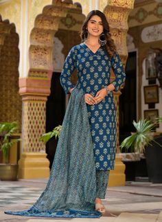 Grab this beautiful 3-piece set. The set comes with straight cut printed kurta has v neck, 3/4th sleeves & calf length teamed with printed trouser pants and a chanderi cotton dupatta to match. Color - Blue Kurta Fabric-Viscose Pant Fabric-Viscose Dupatta Fabric- Chanderi Cotton Neck-V Neck Sleeves-3/4th Sleeves Work - Print Detailing Washing Instructions-Dry Clean Model Height - 5.5 wearing size small. DISCLAIMER - The color of the product may be differ due to screen settings of device. A mispri Cotton V-neck Sets For Diwali, Diwali Cotton V-neck Sets, Cotton V-neck Set With Dupatta, Unstitched Printed Sets For Navratri, Unstitched V-neck Sets With Printed Motifs, Long Sleeve Palazzo Set For Eid, Long Sleeve Matching Palazzo Set For Eid, Printed Semi-stitched Straight Kurta Set, Festive V-neck Printed Sets