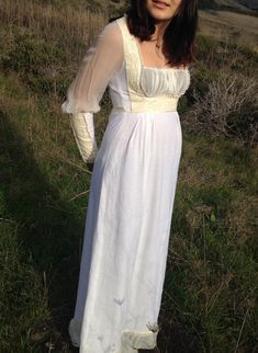 Elegant Long Sleeve Dress For Gatherings, Fitted Cream Dresses With Sheer Sleeves, Fitted Cream Dress With Sheer Sleeves, Cream Fitted Dress With Sheer Sleeves, White Fitted Dress For Gatherings, Vintage Long Sleeve Dresses For Gatherings, White Long Sleeve Dress With Yoke Detail, White Linen Wedding Dress, Prairie Wedding Dress