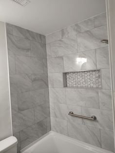 Grey Bathroom Shower Tub Combo Porcelain Tile, Small Old Bathroom Tile Shower Over Tub, White And Grey Bathroom With Tub, Shower Tile Ideas Gray, Tub Tile Ideas Bathtubs, Bathroom Shower Tile Combinations, Bath Tub Tile Ideas, Grey Tile Shower Ideas, Bathroom Shower Tub Combo, Tub Tile Surround Ideas