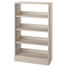 a white book shelf with four shelves on each side