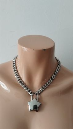 The product is a combination of stainless steel chains and alloy hearts. The length of the necklace on the model is 16 inches. If you need other lengths, please write to customize other lengths. The width of the necklace is 11mm, approximately 4.33 inches. You can also write to inquire about the width you need. White Silver Cuban Link Chain Necklace, White Cuban Link Silver Chain Necklace, Cuban Link Silver Chain Necklace, White Heart-shaped Metal Chain Necklace, Silver Choker Necklace With Curb Chain, Silver Curb Chain Choker Necklace, Heart Pendant Stainless Steel Chain Necklace With Adjustable Chain, White Stainless Steel Chain Necklace, Chunky Chain Link Stainless Steel Necklace