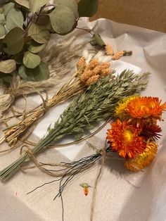 dried flowers and leaves on a table