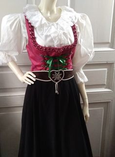 90s folk dress, traditional trachten dress, bavarian tyrolean floral jacquard dress, sleeveless dirndl dress, 40 size, peasant german dress.  white top and the belt are not included.  vintage items always show signs of being worn  please check the measureme nts before ordering  Measurements laying flat : shoulders :33 cm (13 inches)  armpit to armpit(bust) :43 cm (17inches)  waist :37cm (14,5 inches)  hips :free  total lenght :113 cm(44,5 inches) Floral Jacquard, Jacquard Dress, Dress Sleeveless, Panto Costumes, German Dress, Dress Traditional, Folk Dress, Dirndl Dress, Folk Dresses