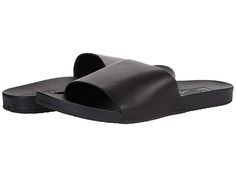 Vans Decon Slide - Women's Shoes : (Leather) Black : Slip into comfort with the Vans Decon Slide featuring a classic slip-on style slide with a well bedded footbed for all day comfort and wear. Available in three color options. Casual slide sandal ready for daily outings. Lightly cushioned footbed. Leather upper and lining. Rubber sole. Imported. Measurements: Weight: 8 oz Product measurements were taken using size 9, width M. Please note that measurements may vary by size. Comfortable Slides With Leather Footbed And Synthetic Material, Solid Color Synthetic Slides With Textured Footbed, Comfortable Textured Slip-on Slides, Comfortable Textured Footbed Slip-on Slides, Cushioned Slip-ons For The Beach, Leather Footbed Slides For Vacation, Everyday Slip-on Slides With Textured Footbed, Leather Footbed Slip-on Slides For Vacation, Synthetic Slides With Leather Footbed