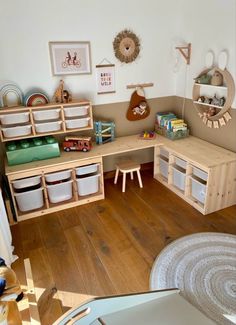 a child's playroom with toys and storage