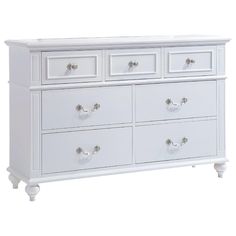 a white dresser with drawers and knobs