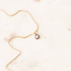 This one-of-a-kind necklace is composed of: Victorian tuxedo stud pendant from the late 1800s featuring an opal stone set in a prong setting. This necklace measures a standard 18” on a modern 14k gold filled chain. The pendant measures .25” in width. Dainty Pendant Birthstone Necklace For Formal Occasions, Elegant Opal Necklace With Pearl Pendant, Dainty Opal Pendant Necklace, Formal Opal Necklace With 17 Jewels, Victorian Opal Jewelry In Yellow Gold, Victorian Opal Jewelry For Formal Occasions, Victorian Opal Yellow Gold Jewelry, Victorian Yellow Gold Opal Jewelry, Elegant Opal Necklaces With Adjustable Chain