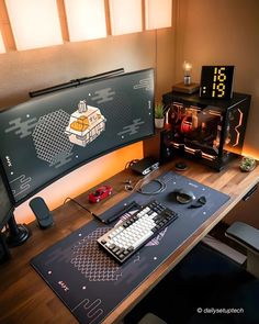 a desk with a computer monitor, keyboard and mouse