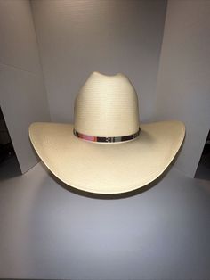 Wrangler Cowboy Hat Genuine Lamb Skin 7 Star Straw Made in Texas SIZE 7 3/8 USA. Hat band included with cheetah on it. Great shape. Will buy hat box to ship in. White Flat Bill Sun Hat For Ranch, White Flat Bill Sun Hat For Rodeo, Western Straw Hat With Flat Bill For Ranch, Western Straw Hat With Flat Bill For Country Events, Western Straw Hat For Country Events With Flat Bill, Western Straw Hat For Country Events, Casual Straw Hat With Flat Bill For Rodeo, Casual Adjustable Fit Hat For Rodeo, Casual Flat Bill Straw Hat For Rodeo