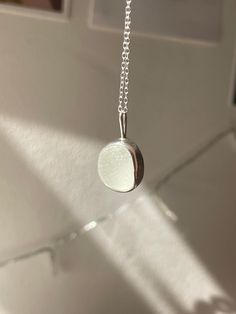 Handmade sterling silver Sea Glass necklace, made with recycled silver, and genuine Sea Glass from the Jurassic Coast. This necklace has one large piece of white Sea Glass, and is very dainty and elegant.  This necklace is a perfect gift for a special occasion, and is perfect for Sea Glass lovers! The chain is 18" (45cm), and has an easy closure. All of the silver on the necklace is 925 Sterling Silver, including the chain and small jump rings! Feel free to message me for any additional information, or for commissions/custom requests! White Polished Necklaces For Everyday, Everyday White Necklaces With Polished Finish, Chain Jewellery, White Sea Glass, Jurassic Coast, Silver Sea, Jewellery Gifts, White Sea, For Her Gifts