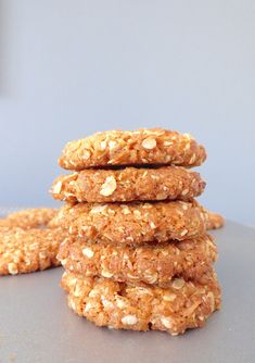 three cookies stacked on top of each other with oatmeal toppings in the middle