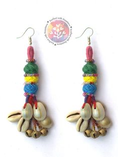 the earrings are made with shells and beads