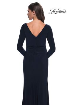 Exude timeless elegance in the La Femme 30881 gown, a creation that captivates with its refined simplicity. Tailoring details gracefully highlight the feminine form, shaping a bateau neckline adorned with long sleeves for a classic touch. Ruching textures the ensemble, adding depth and visual interest. The full back, complete with a concealed zipper closure, ensures a seamless and polished appearance. The sheath skirt gracefully falls to a floor-length hem, featuring a subtle yet sophisticated r Formal Fitted Evening Dress With Boat Neck, Elegant Long Sleeve Evening Dress For Formal Occasions, Elegant Fitted Long Sleeve Dress For Formal Occasions, Long Sleeve Evening Dress With Back Zipper, Elegant Long Sleeve Dress With Fitted Bodice, Elegant Fitted Long Sleeve Formal Dress, Classic Long Sleeve Dresses For Gala, Elegant Fitted Evening Dress With Boat Neck, Elegant Boat Neck Gala Dress