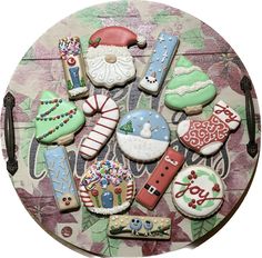 decorated cookies are arranged in the shape of santa's sleigh