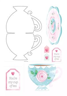 paper cut outs with teacups and tags on the top, one has a pink flower in it