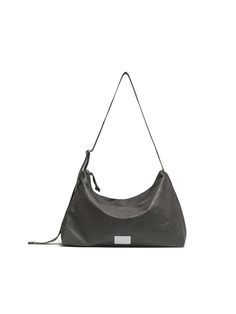 Editor's NoteClassic and sophisticated accessories that go with everything.- Fabric hobo bag silhouette with leather texture- Subtle glossy and soft touch leather used- Length adjustable webbing strap- Vegetable leather label pointMeasurements(in.)- Size: 14.17 in. * 6.30 in. * 9.84 in.- Strap: 39.37 in. Composition & Care- 100% Synthetic Leather / 100% Cotton- Avoid direct heat and moisture- The leather may have fine scratches and wrinkles- Products may be damaged by alcohol, oil, cosm Gray Leather Hobo Bag For Daily Use, Gray Leather Hobo Shoulder Bag, Modern Gray Shoulder Bag With Adjustable Strap, Gray Leather Bags With Gunmetal Hardware, Gray Leather Shoulder Bag With Removable Pouch, Modern Gray Shoulder Bag With Leather Handles, Gray Hobo Bag With Adjustable Strap, Gray Leather Hobo Bag For Everyday Use, Gray Hobo Bag With Adjustable Strap For Everyday